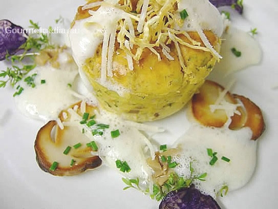 Yellow boletus mushroom soufflé with garlic sauce
